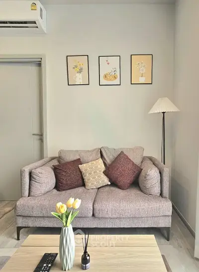Cozy living room with stylish decor and comfortable seating, perfect for relaxation and entertaining guests.