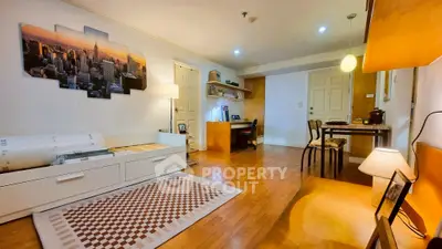 Spacious living room with wooden flooring and modern decor