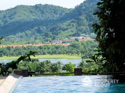 Stunning infinity pool with panoramic mountain and lake views