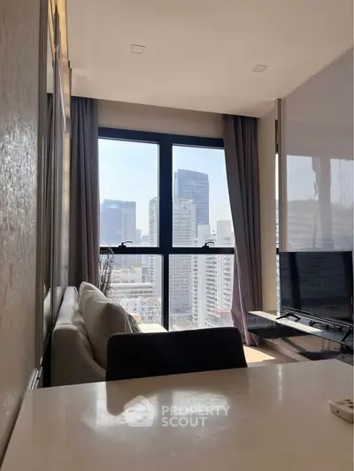 Modern living room with stunning city view and sleek furniture