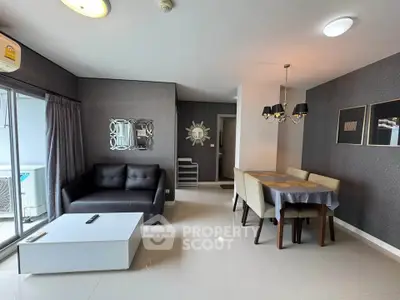 Modern living room with elegant dining area and stylish decor