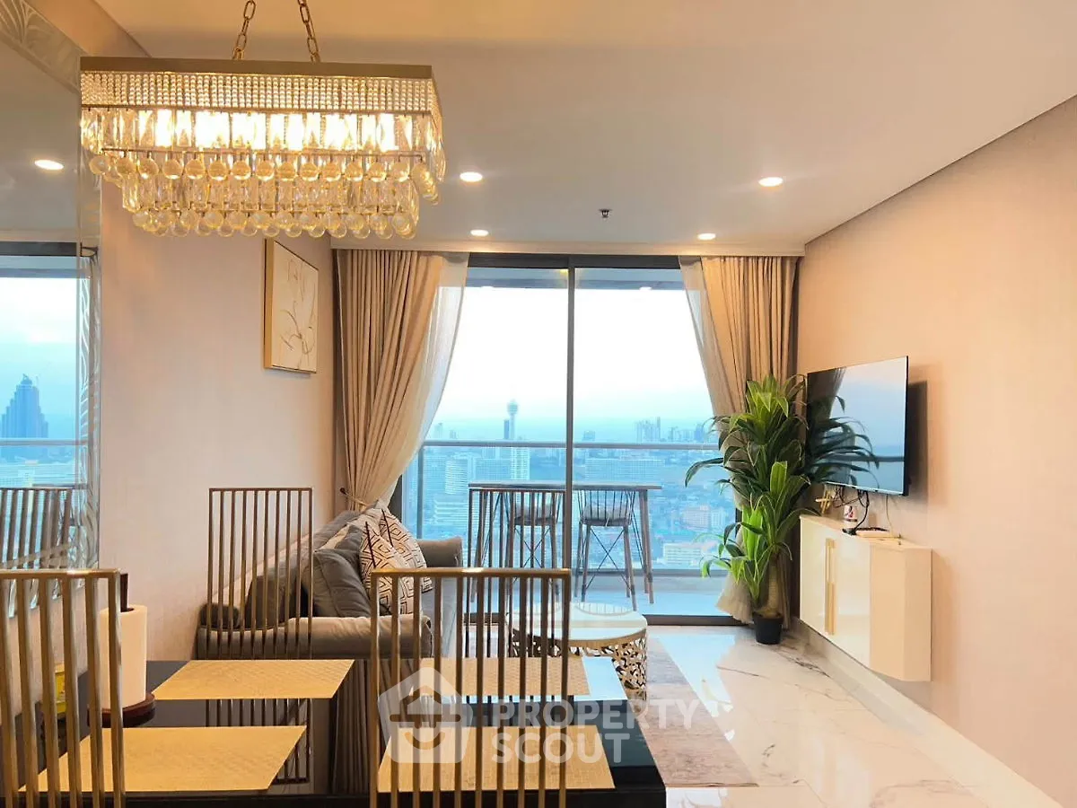 Luxurious living room with stunning city view and elegant chandelier