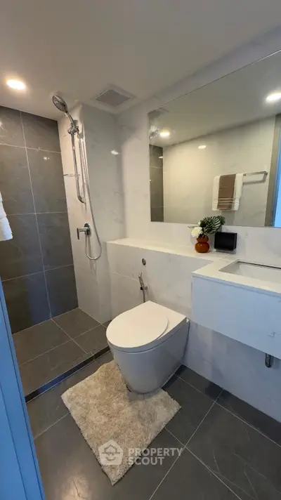 Modern bathroom with sleek design and spacious shower area