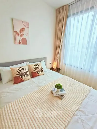 Cozy bedroom with elegant decor and natural light