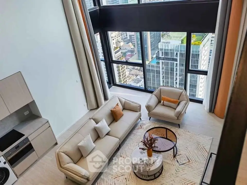 Stunning high-rise apartment with floor-to-ceiling windows and modern open-plan living area.