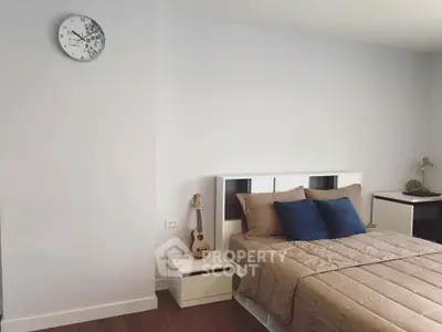 Cozy bedroom with modern decor and stylish bedding