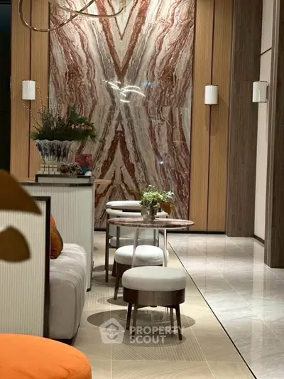 Luxurious modern living room with elegant marble wall and stylish furniture