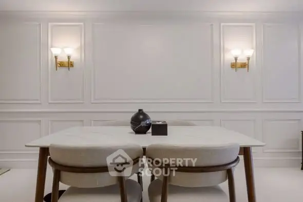 Elegant dining room with modern decor and stylish lighting