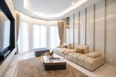 Luxurious modern living room with elegant decor and ample natural light