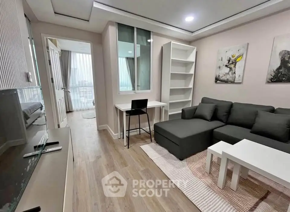 Modern living room with stylish furniture and open layout, perfect for urban living.