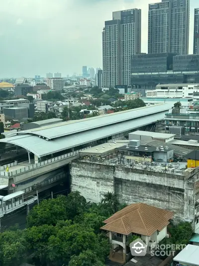 Stunning cityscape view with modern high-rise buildings and lush greenery, perfect for urban living.