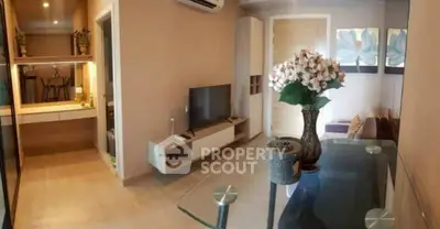 Charming living room with modern decor and glass dining table