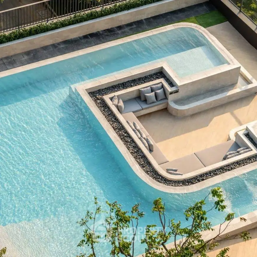 Luxurious rooftop pool with modern seating area and stunning design.
