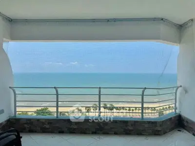 Stunning beachfront balcony with panoramic ocean views and modern railing design.