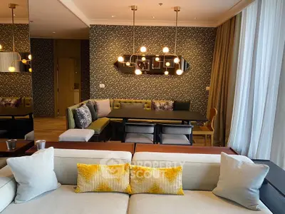 Stylish modern living room with elegant lighting and cozy seating area