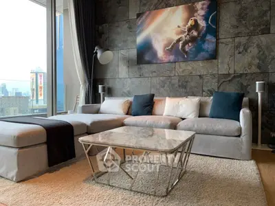 Luxurious modern living room with stylish decor and city view, featuring a plush sofa and elegant coffee table.