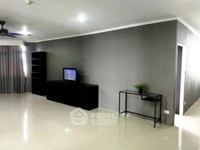 Spacious modern living room with sleek furniture and minimalist decor