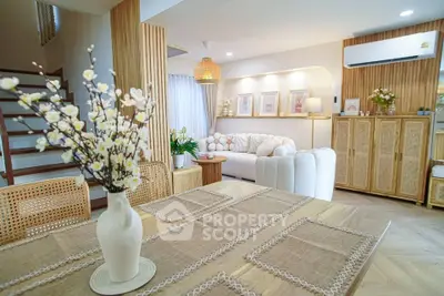 Chic and cozy living room with modern decor and elegant dining area