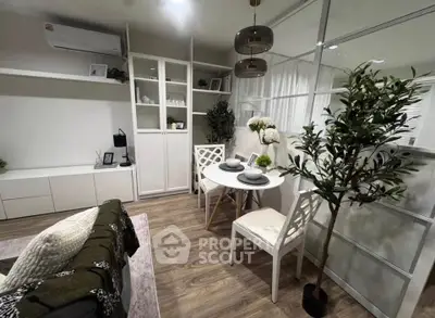 Chic modern living room with dining area, featuring stylish decor and cozy ambiance.
