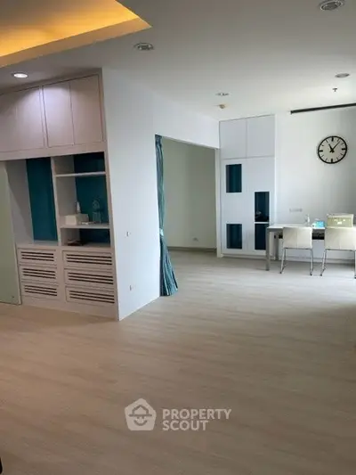 Spacious modern living area with open layout and stylish furnishings