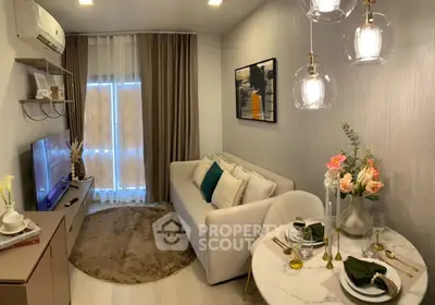 Chic modern living room with cozy sofa, stylish decor, and elegant lighting
