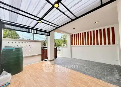 Spacious covered patio with modern design and natural light