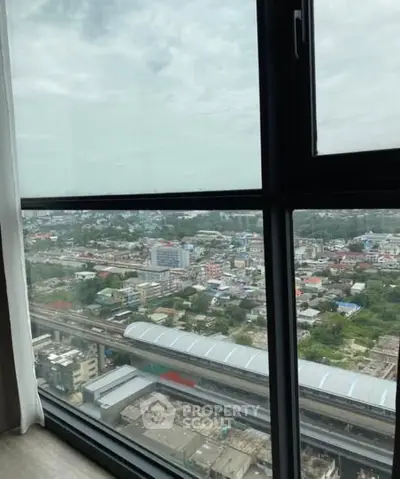 Stunning cityscape view from high-rise apartment window