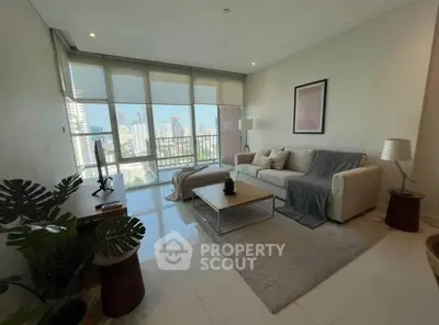 Spacious living room with stunning city view and modern decor