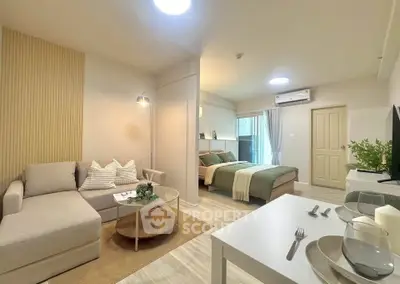 Modern studio apartment with cozy living area and stylish decor