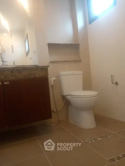 Modern bathroom with sleek fixtures and elegant tile design