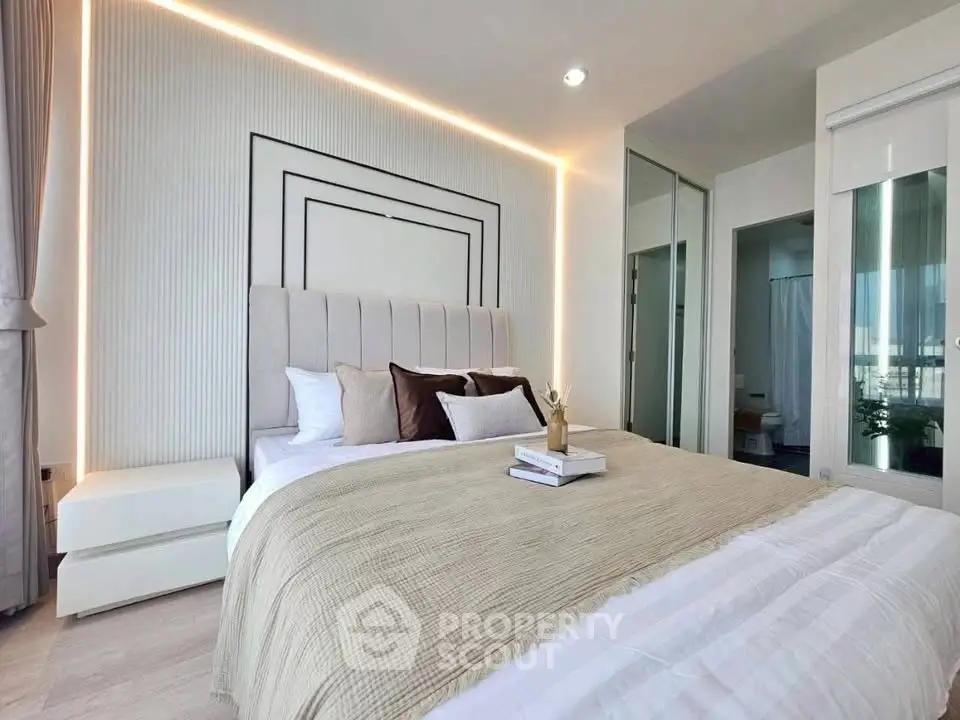Luxurious modern bedroom with elegant lighting and stylish decor