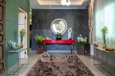 Elegant interior with modern decor and stylish furniture in a luxurious living space.