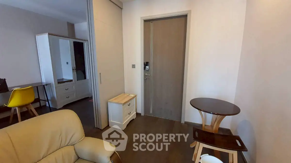 Cozy interior room with modern furniture and wooden flooring, perfect for a comfortable living space.