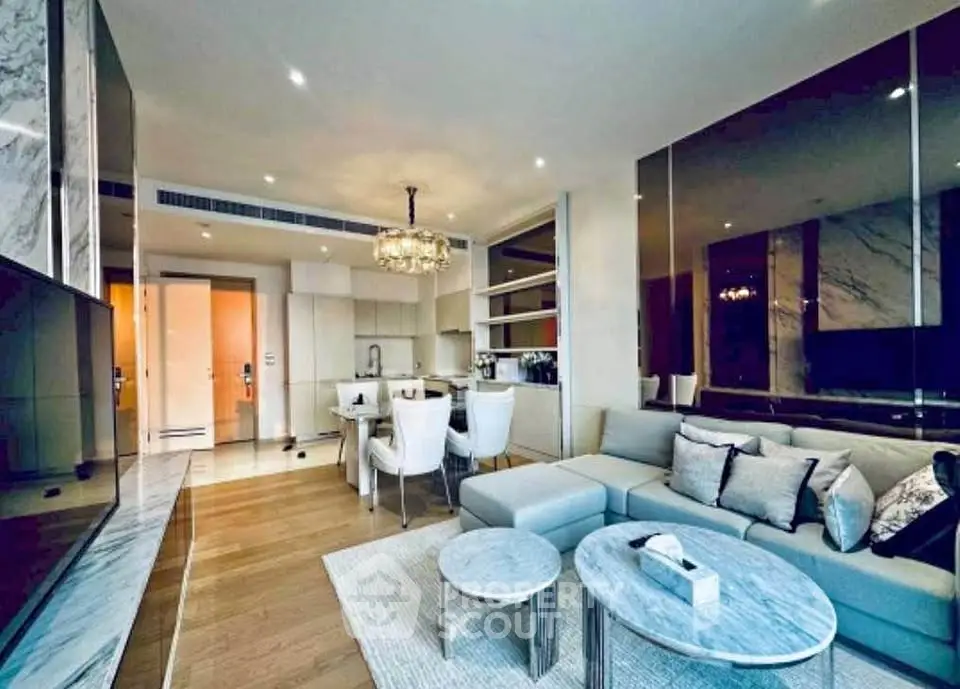 Luxurious modern living room with elegant decor and open kitchen layout