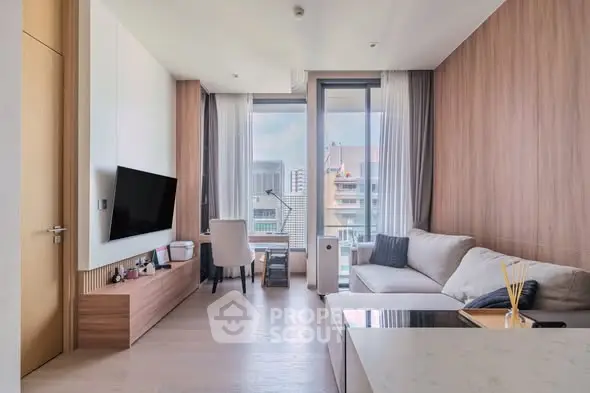 Modern living room with city view, stylish furniture, and natural light.