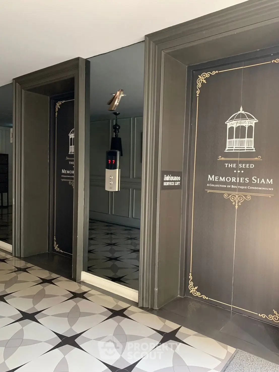 Elegant elevator entrance in luxury condominium with stylish design and modern features.