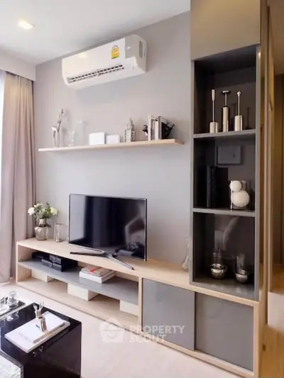 Modern living room with sleek TV unit and stylish decor