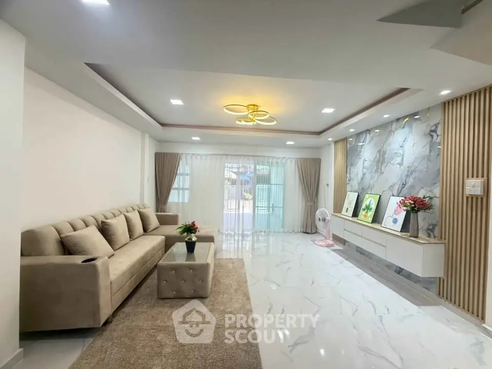 Spacious modern living room with elegant decor and natural light