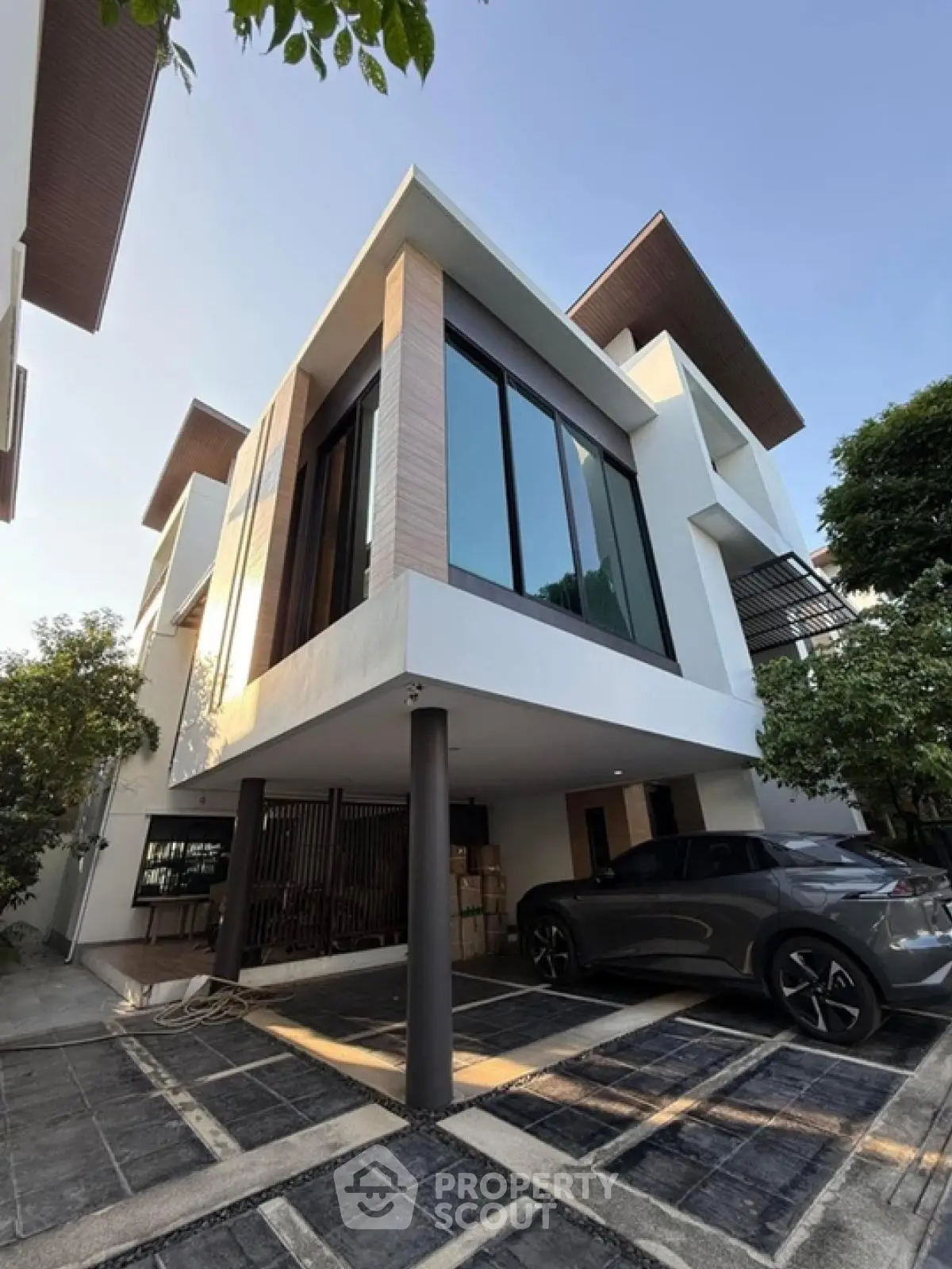 Modern luxury house with sleek design and spacious parking area