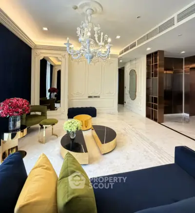 Luxurious living room with elegant chandelier and modern decor