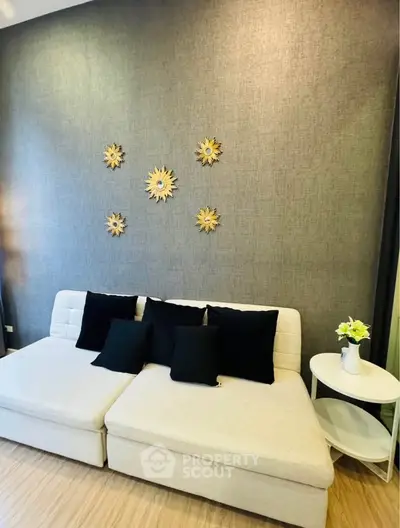 Stylish living room with modern decor and comfortable seating, perfect for relaxation and entertaining guests.