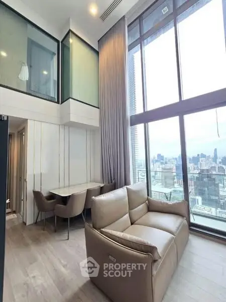 Luxurious high-rise living room with stunning city view and modern decor