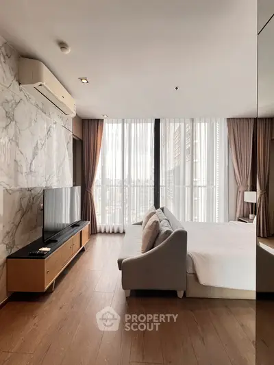 Luxurious modern bedroom with floor-to-ceiling windows and elegant decor