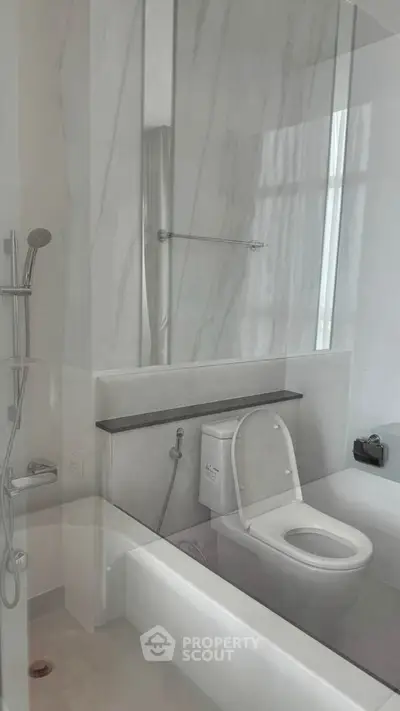 Modern bathroom with sleek design and marble accents