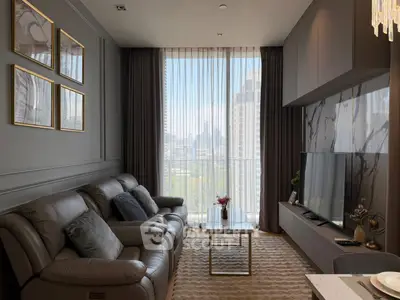 Luxurious living room with leather sofa and city view through large window