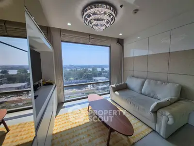 Luxurious living room with stunning city view and elegant chandelier
