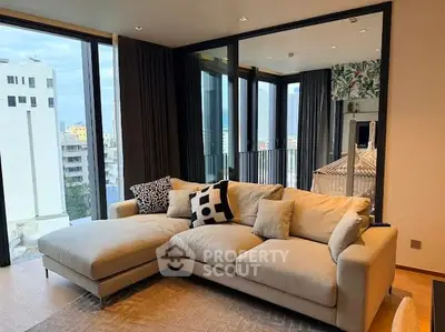 Luxurious living room with modern sofa and city view balcony