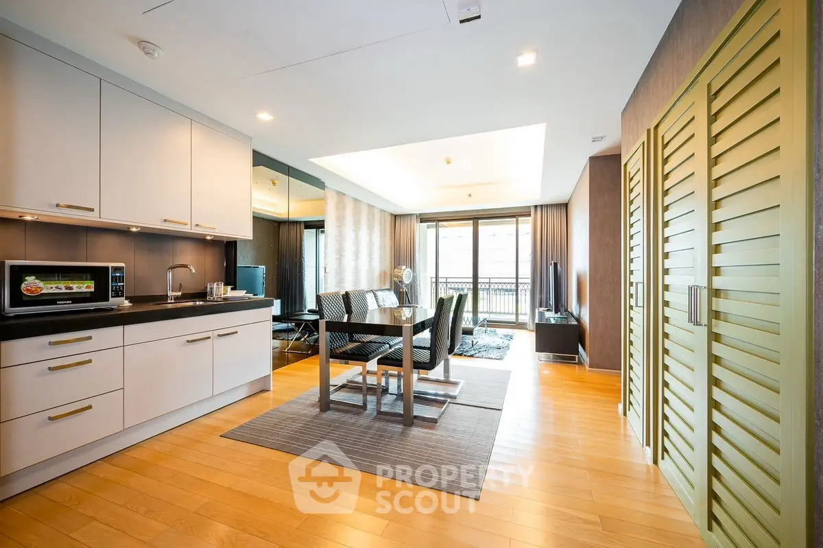 Spacious modern living room with open kitchen and elegant dining area