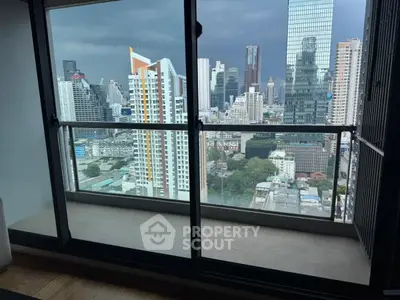 Stunning cityscape view from a modern high-rise balcony, perfect for urban living enthusiasts.
