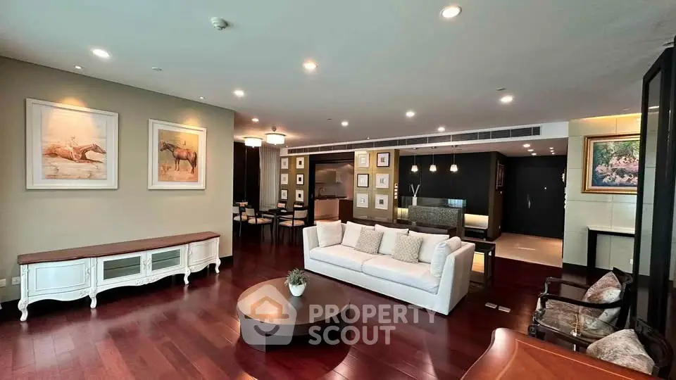 Spacious modern living room with elegant decor and hardwood floors